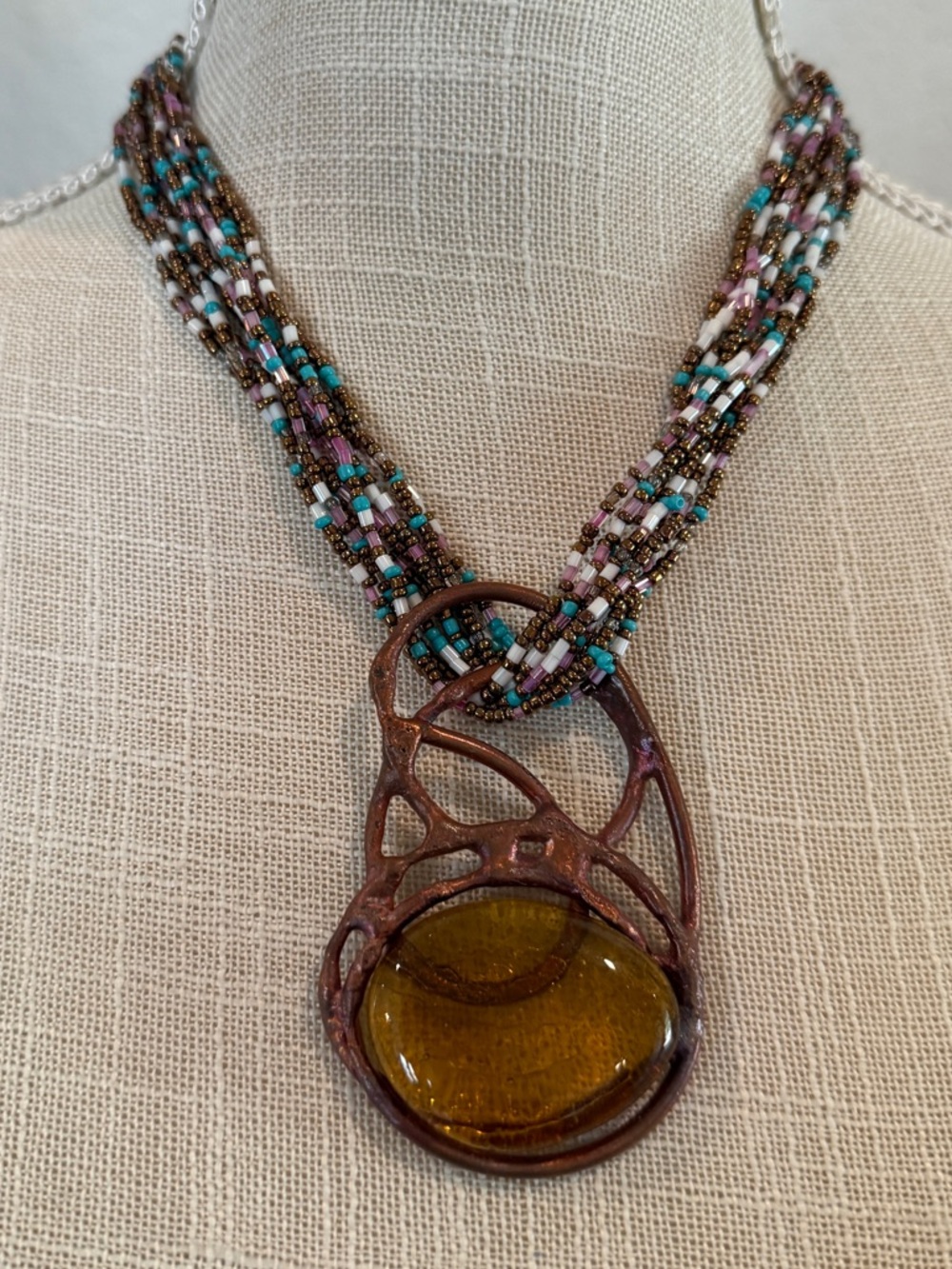 Unique Handcrafted Multistrand Beaded Necklace with Amber Glass Pendant